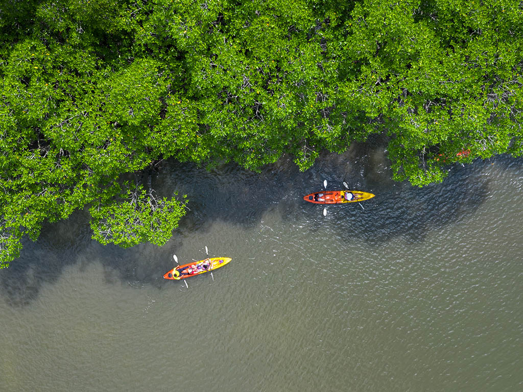 Tandem kayaks on river